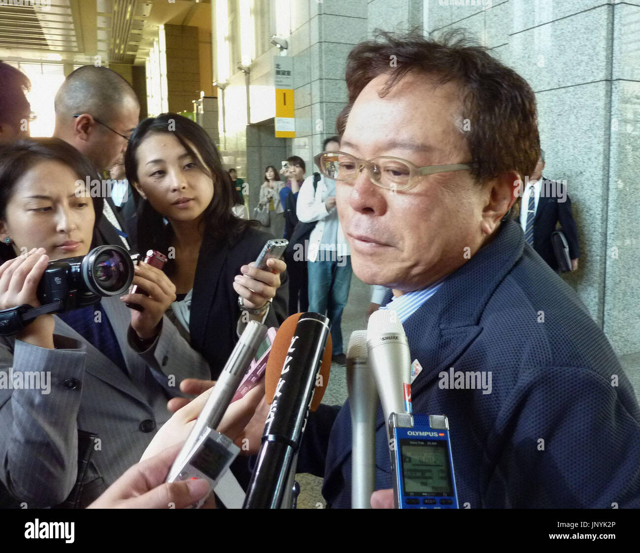 TOKYO, Japan - Tokyo Vice Gov. Naoki Inose is surrounded by reporters ...