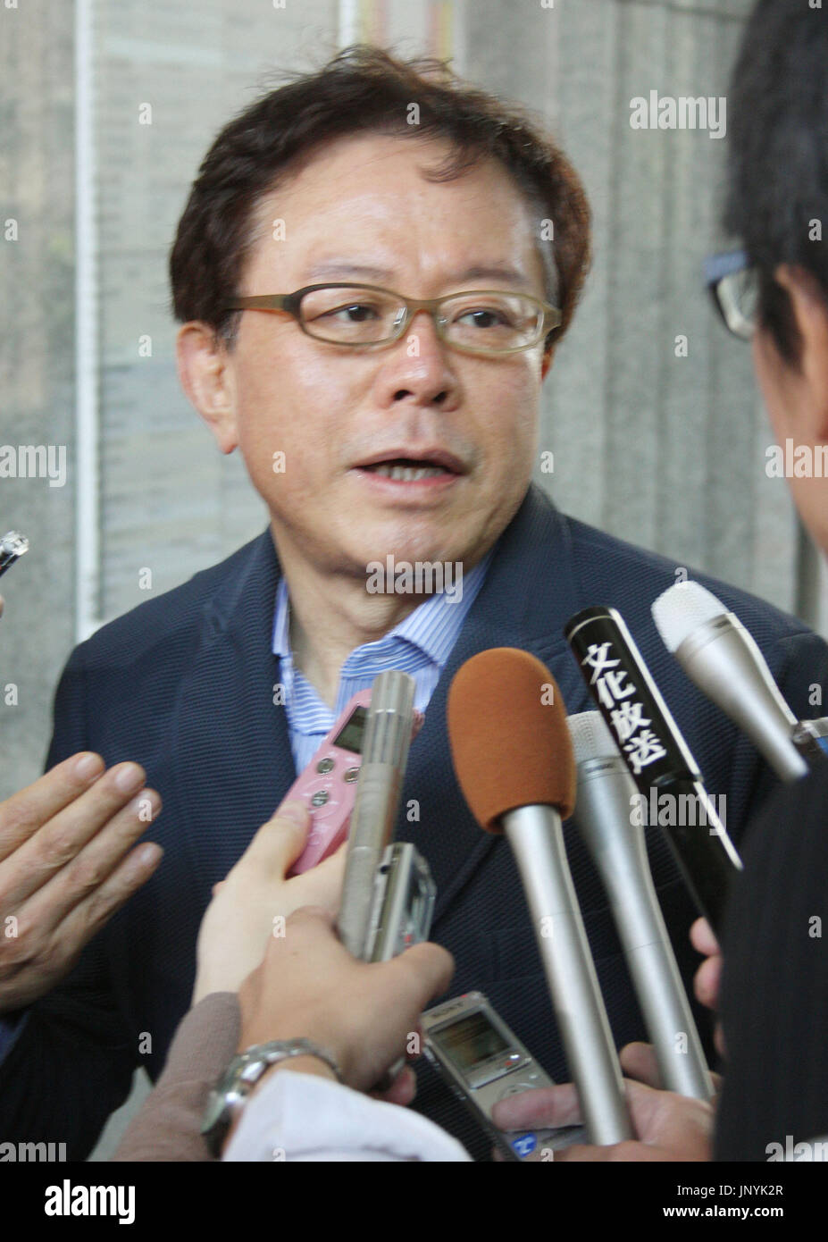 TOKYO, Japan - Tokyo Vice Gov. Naoki Inose is surrounded by reporters ...