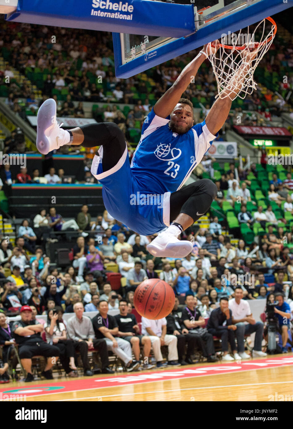Hong Kong, China. 30th July, 2017. HONG KONG, CHINA - JULY 30: No 23 Justin Anderson,Philadelphia 76ers, scores.To celebrate the 20th Anniversary of the formation of the Hong Kong Special Administrative Region (HKSAR), the Yao Foundation (started by Chinese basketball player Yao Ming) host a charity match between the American professional Nike rising star team and the Chinese Men's basketball stars team ( Chinese Mens win 66-63. Hong Kong, Hong Kong SAR, China on July 30, 2017. Alamy Live News/Jayne Russell Credit: Jayne Russell/Alamy Live News Stock Photo