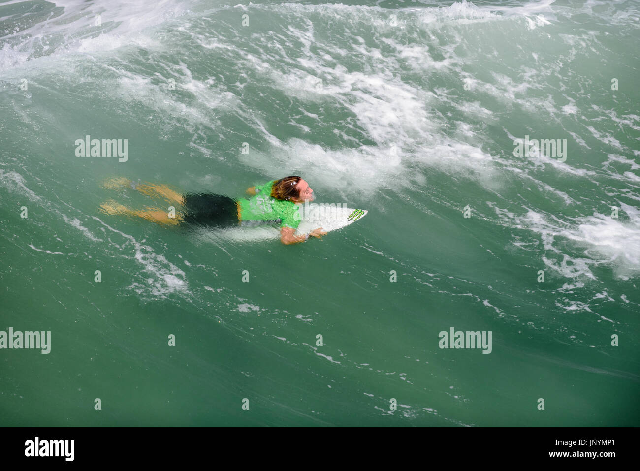 Huntington Beach, USA. 30 July, 2017. Surfer Parker Coffin (USA) competes in the final round of competition at the 2017 VANS US Open of Surfing Trials. Credit: Benjamin Ginsberg/Alamy Live News. Stock Photo