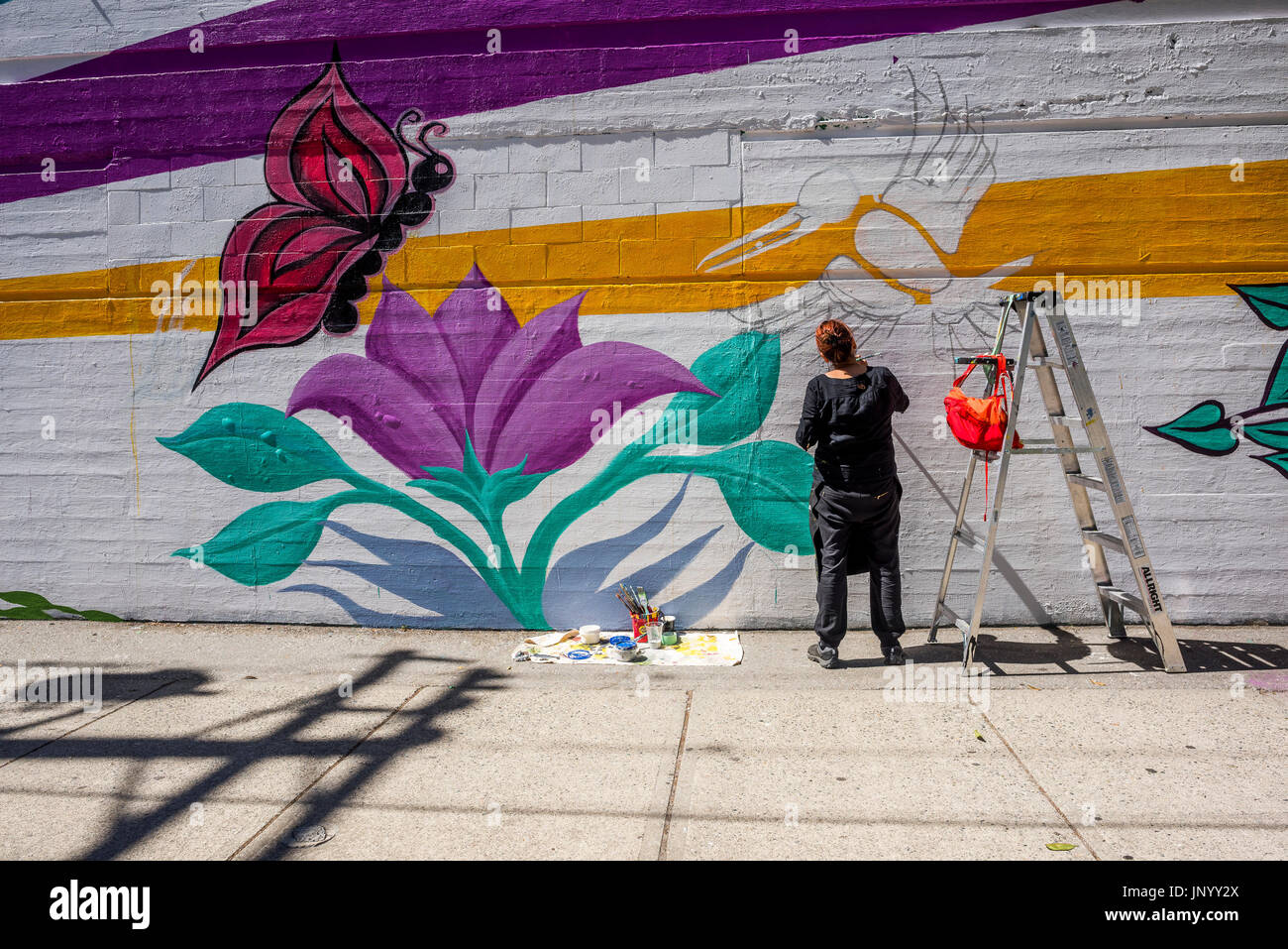 Vancouver, Canada. 30th Jul, 2017. Mural painter at the Drum is Calling
