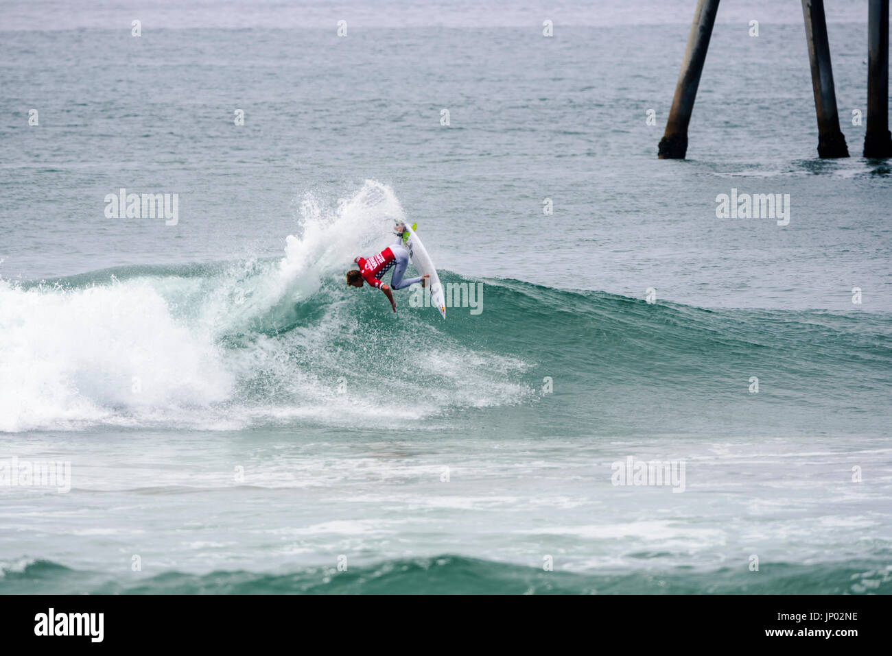 Huntington Beach, USA. 31 July, 2017. Kolohe Andino (USA) goes nearly inverted during ound 2 of competition at the 2017 VANS US Open of Surfing. Credit: Benjamin Ginsberg/Alamy Live News. Stock Photo