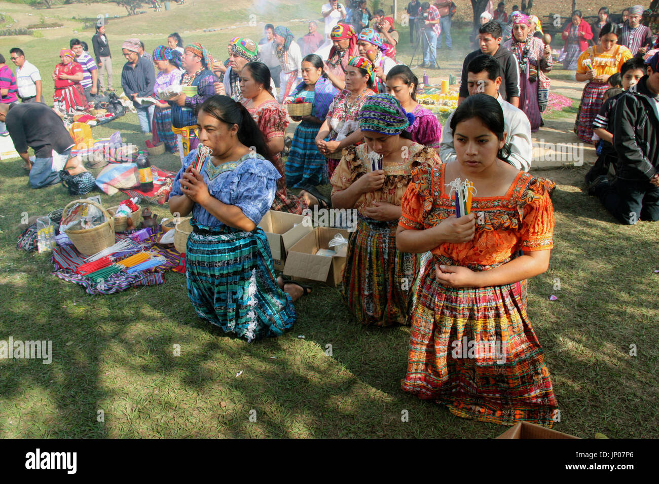 GUATEMALA CITY, Guatemala - Indigenous people pray during a ceremony in
