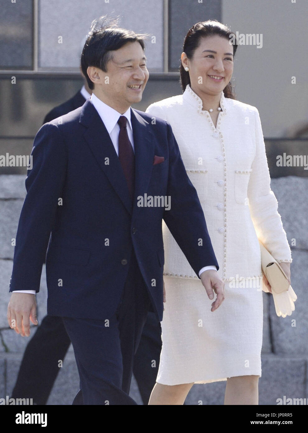 TOKYO, Japan - Crown Prince Naruhito (L) and Crown Princess Masako are pictured at Tokyo's Haneda airport before departing for the Netherlands on April 28, 2013, to attend the coronation of the new Dutch king. (Kyodo) Stock Photo
