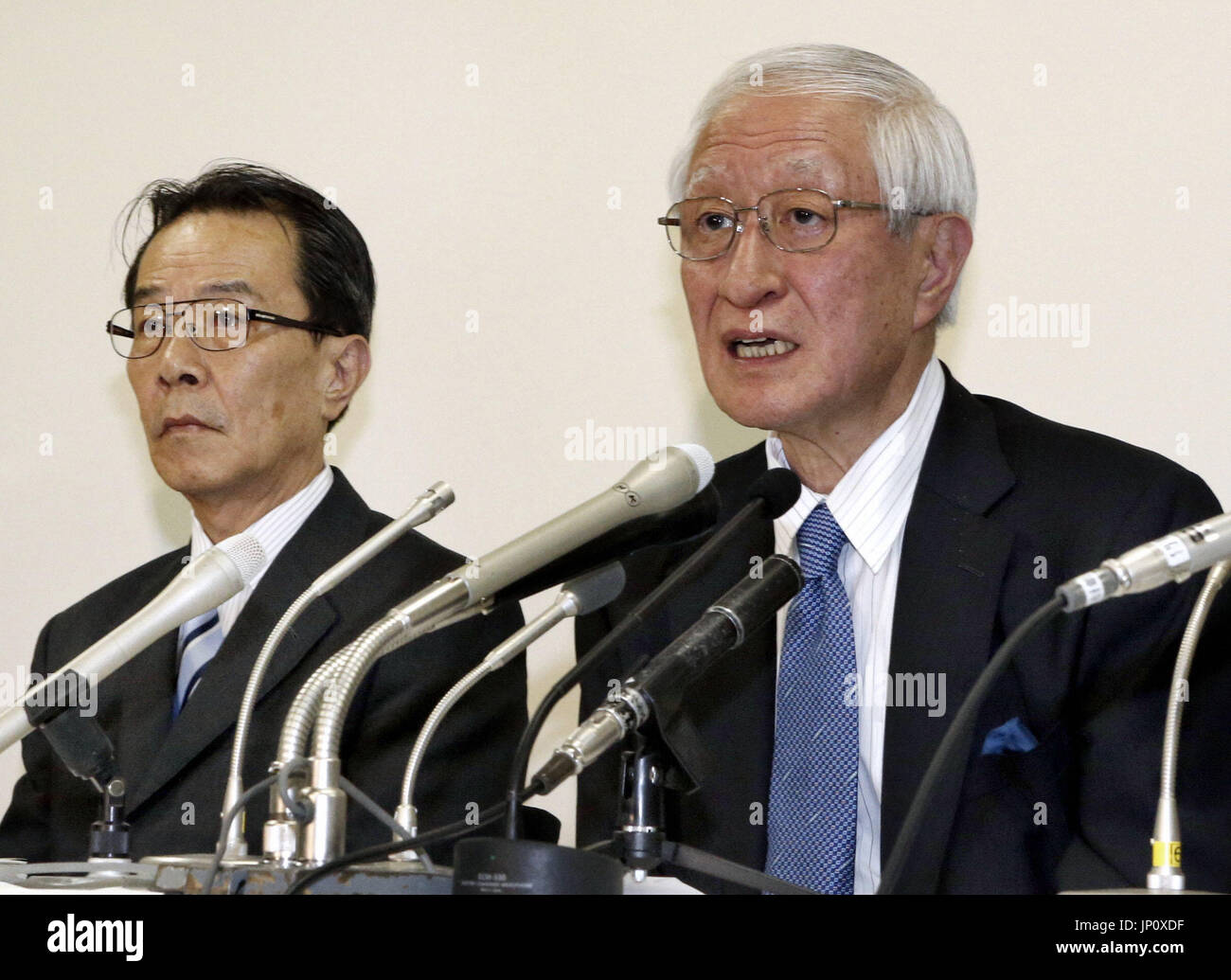 Kimoto Ryozo TOKYO, Japan - Nippon Professional Baseball commissioner Ryozo Kato (R ...