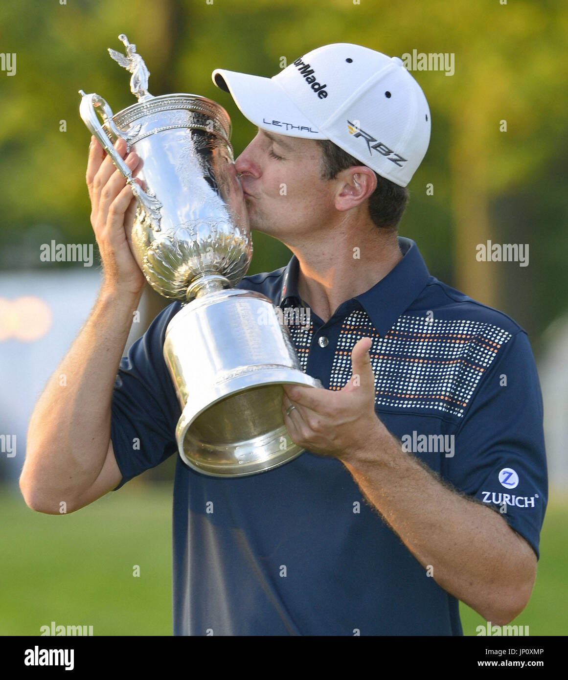 ARDMORE, United States Justin Rose of England kisses the victor's