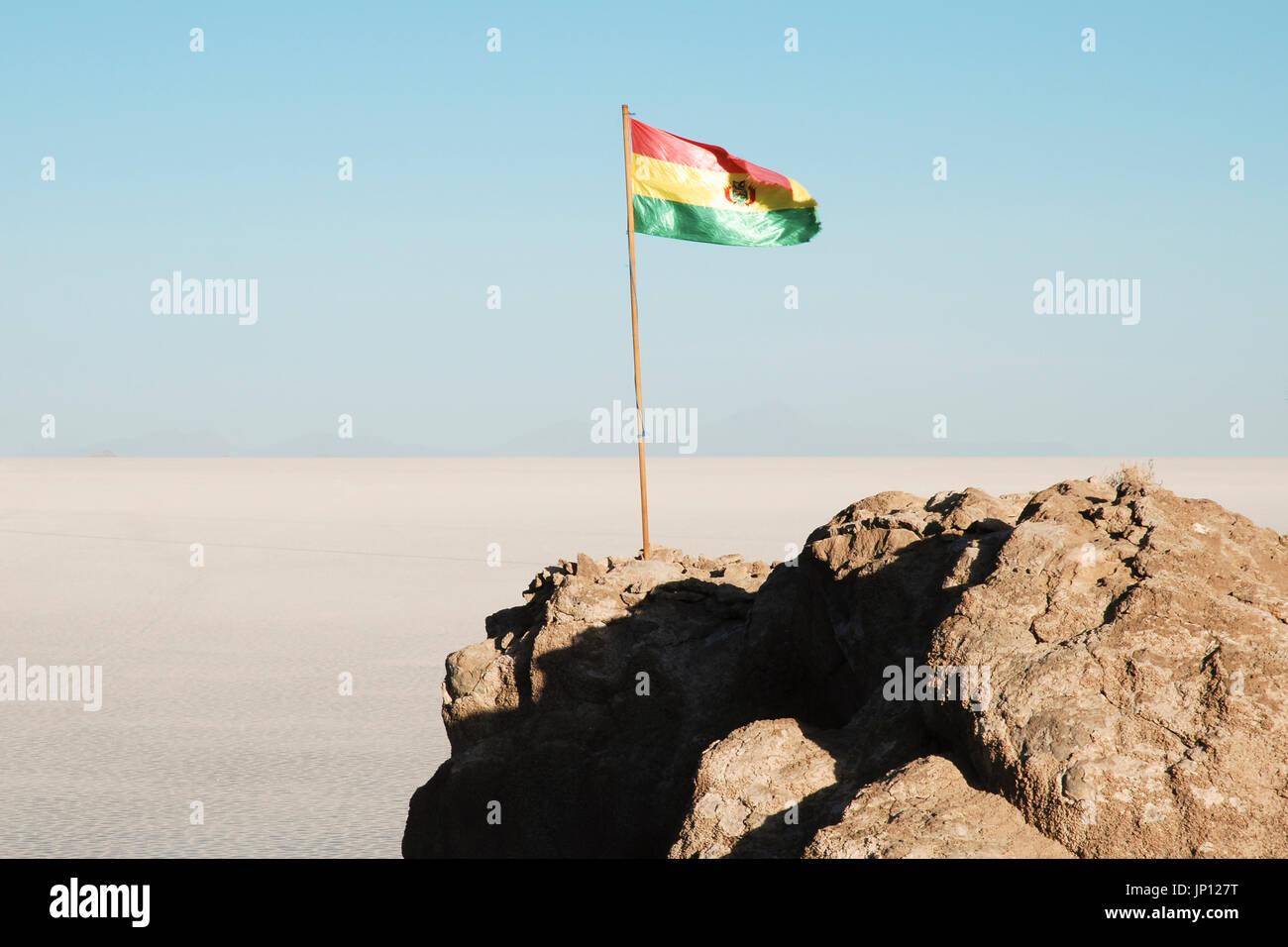 Bolivian flag at Isla del pescado (Fish island), Uyuni salt flats, Bolivia, South America Stock Photo