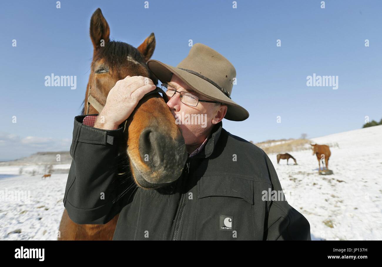 Paca Paca Farm SAPPORO, Japan - Harry Sweeney, owner of Paca Paca Farm, kisses Love ...