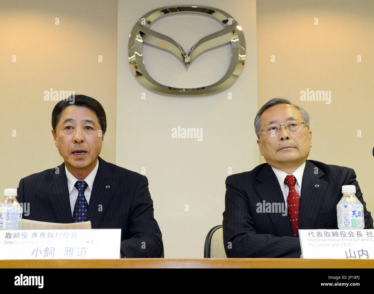 HIROSHIMA, Japan - Masamichi Kogai (L), senior managing executive ...