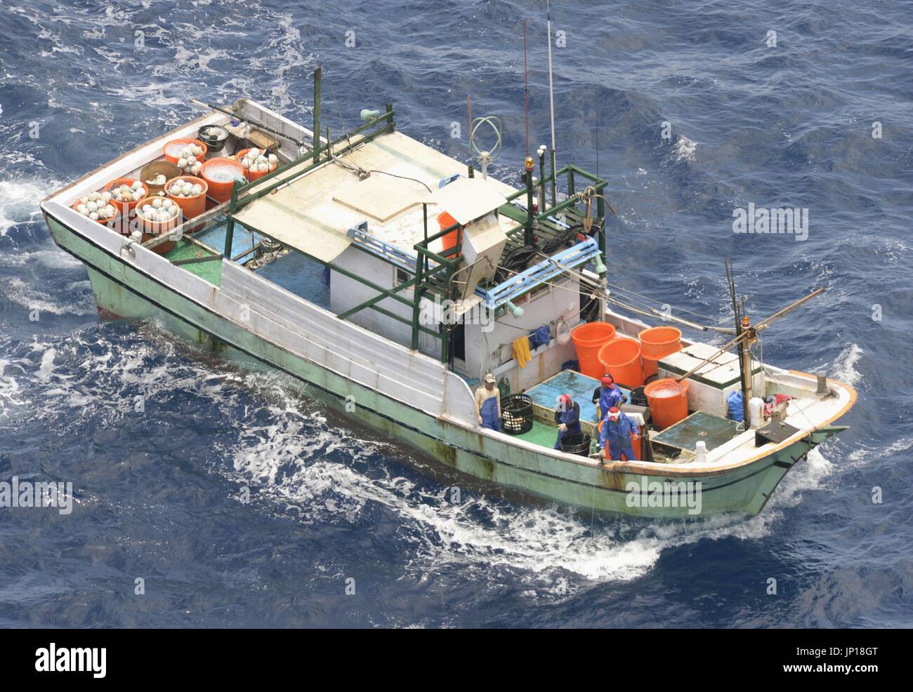 ISHIGAKI, Japan - Aerial photo taken by Kyodo News shows a Taiwanese fishing boat operating in waters north of Ishigaki Island, Okinawa Prefecture, on May 10, 2013. A bilateral fishery agreement came into force the same day allowing Taiwanese fishing boats to operate in Japan's 200-nautical-mile exclusive economic zone near the Senkaku Islands in the East China Sea. (Kyodo) Stock Photo