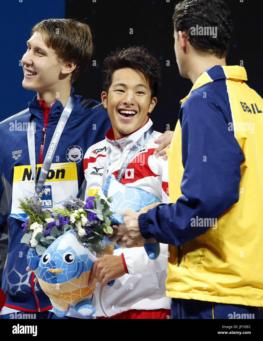 barcelona-spain-japan-s-daiya-seto-c-smiles-during-the-award