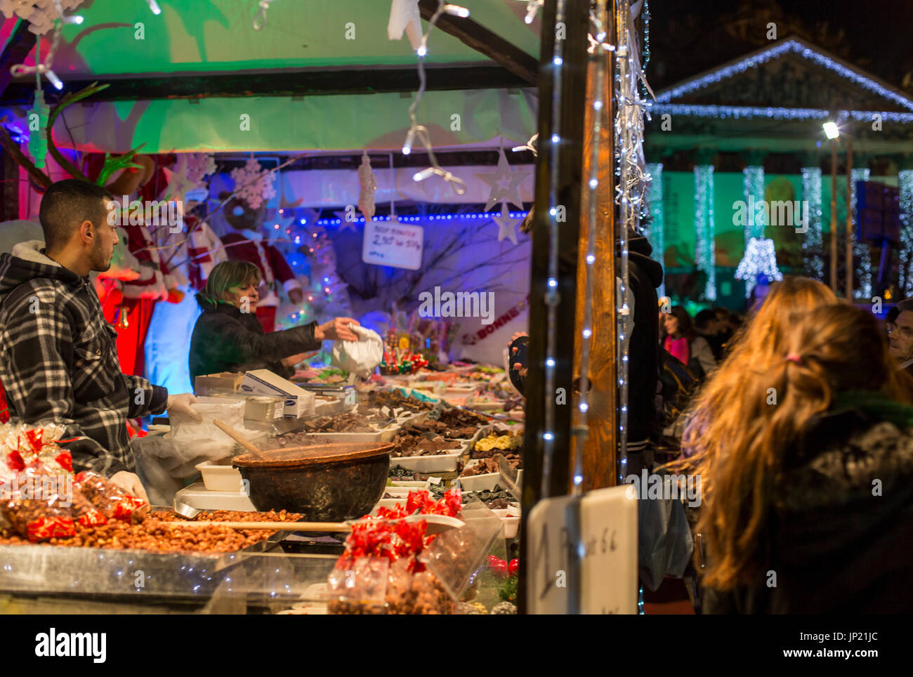 Brussels, Belgium - December 8, 2013: Christmas market food stall and lights in Brussels, Belgium Stock Photo