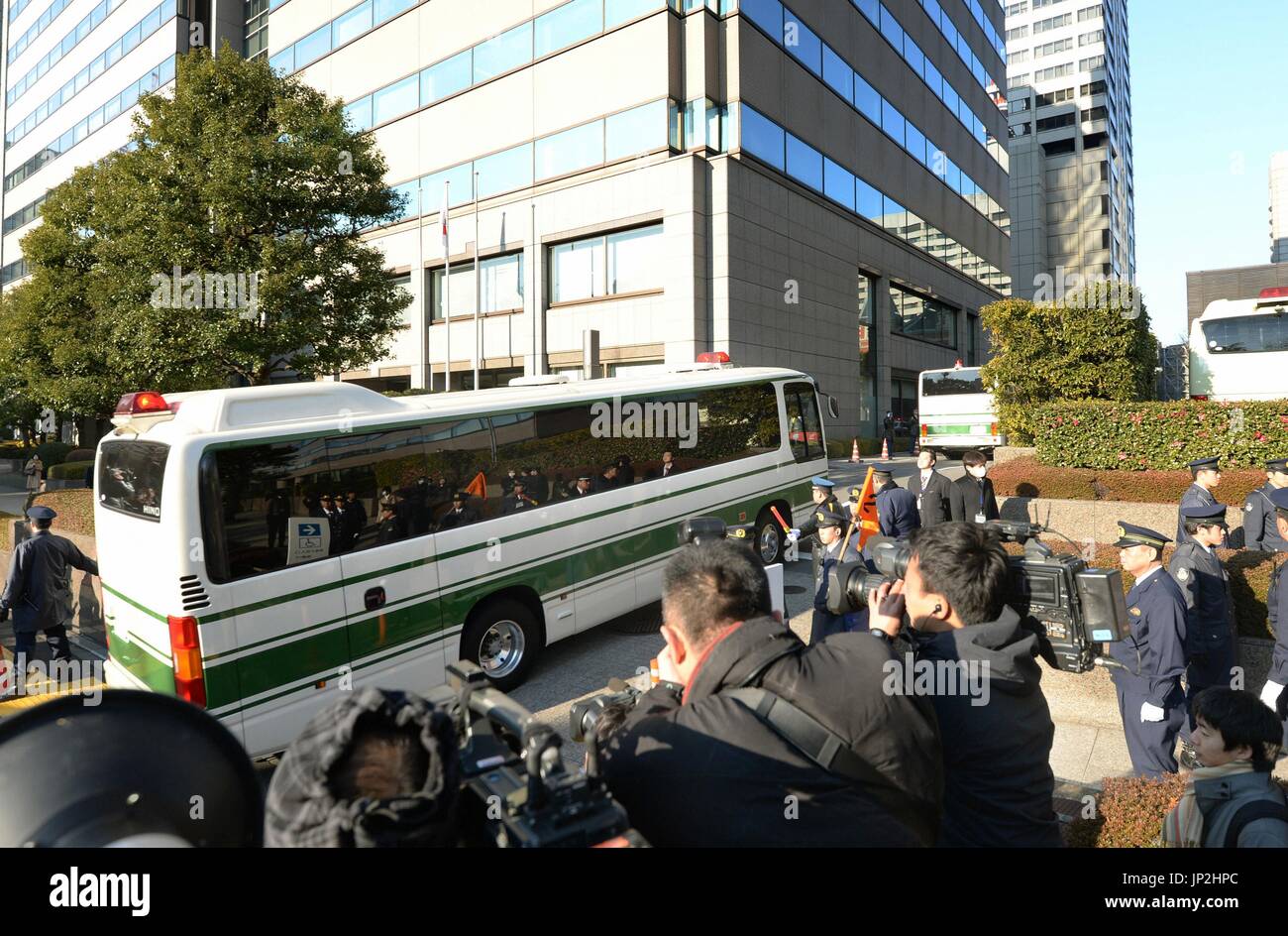 TOKYO, Japan - Two buses, each believed to be carrying a former senior ...