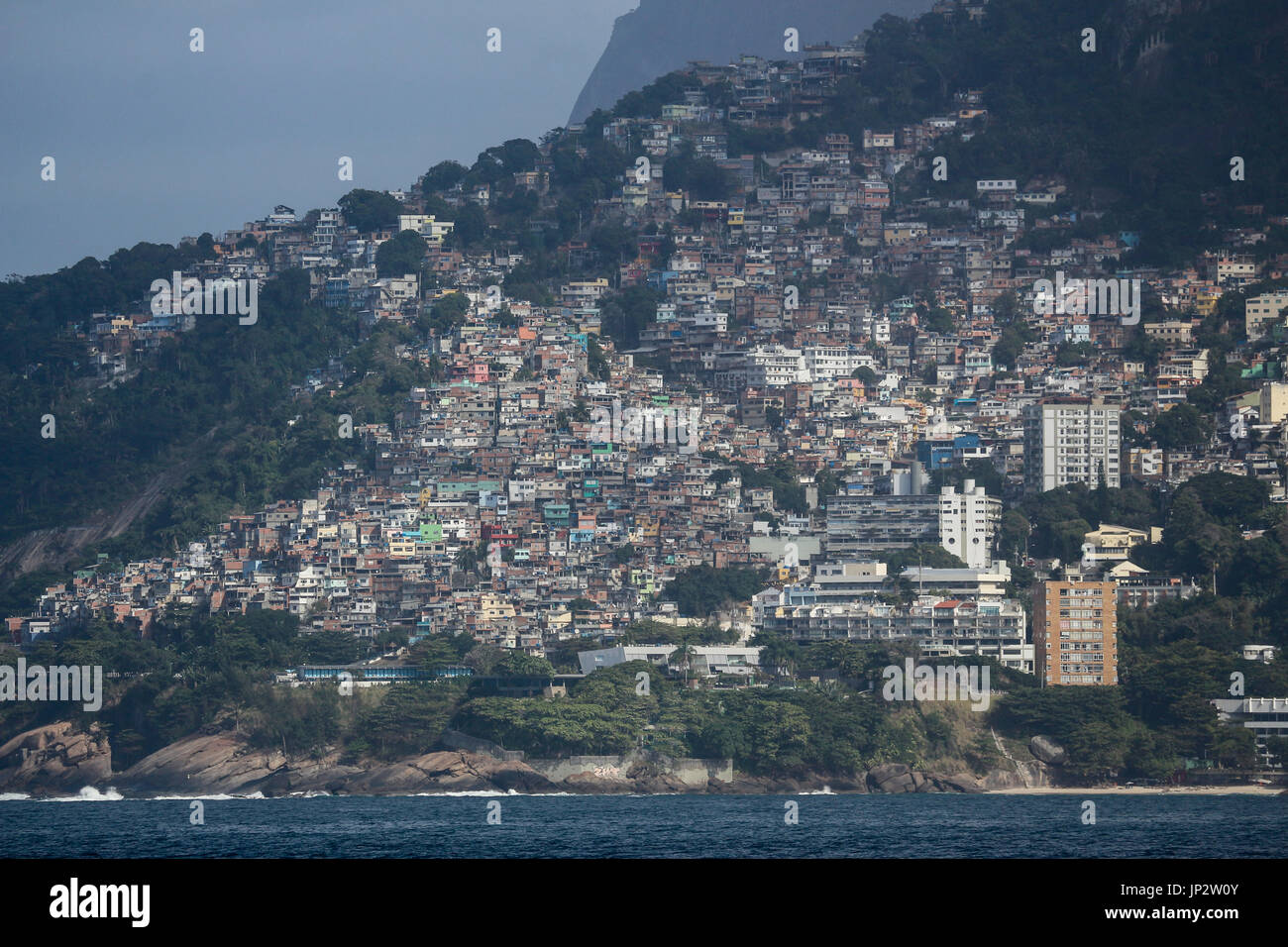 View of Vidigal Favela in Rio de Janeiro, located between Leblon and São Conrado, two of Rio de Janeiro's noblest neighborhoods. The Vidigal favela wa Stock Photo