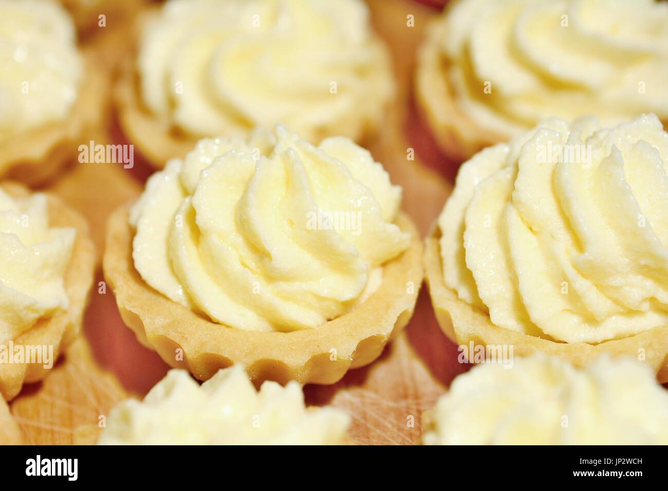 Closeup of cupcakes filled with vanilla cream. Stock Photo