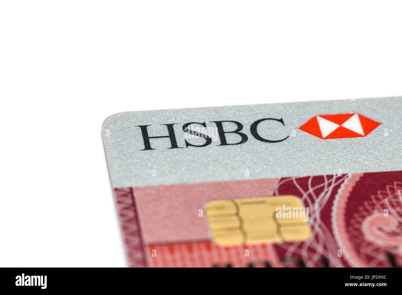 HSBC bank credit card on white background. HSBC Bank is one of the largest banking and financial services organisations. Stock Photo