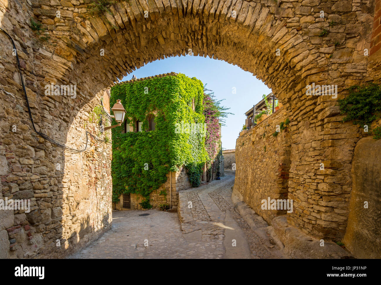 Stone Buildings In Peratallada It Is A Picturesque Medieval Old Town stone-buildings-in-peratallada-it-is-a-picturesque-medieval-old-town