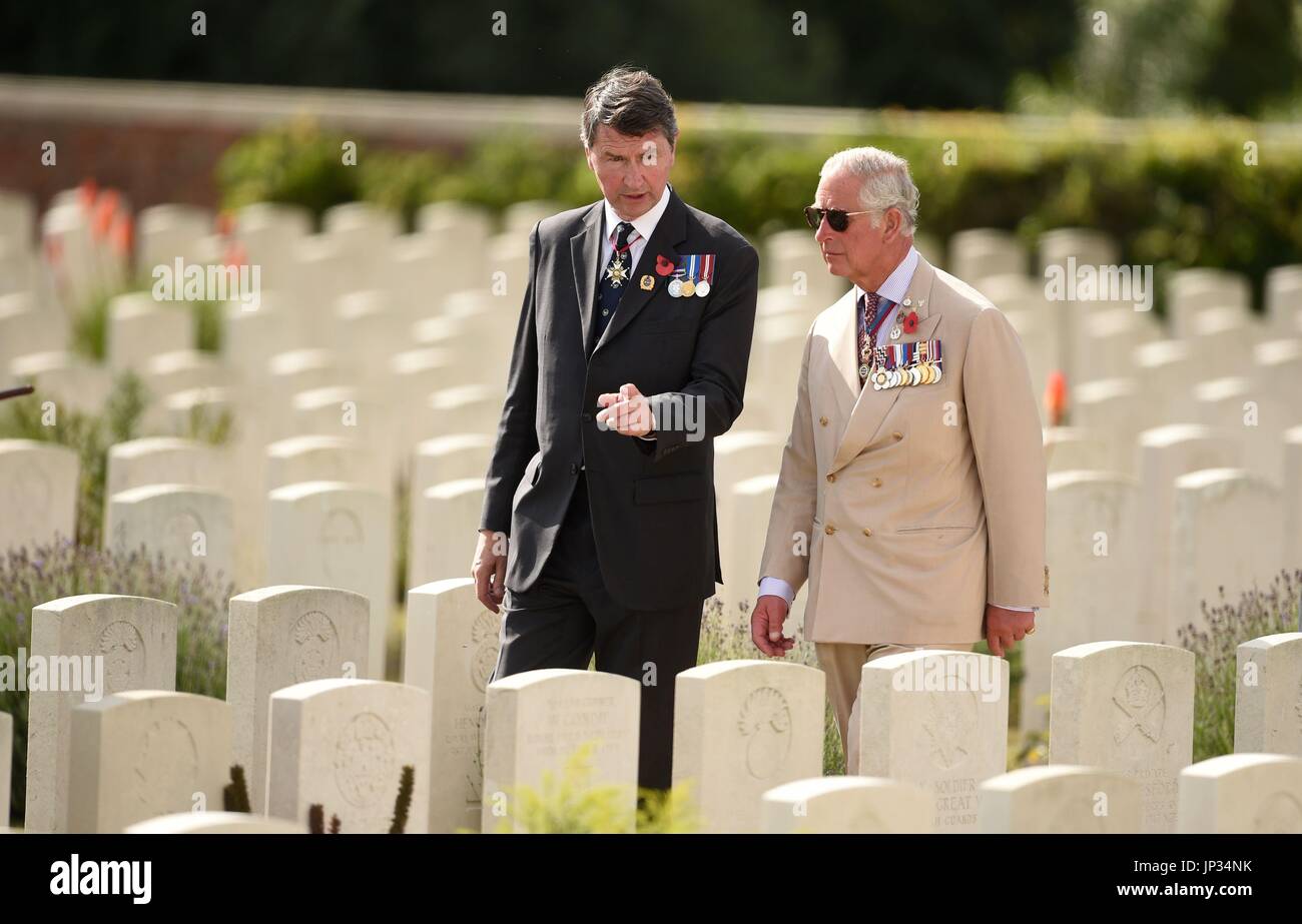 Vice Admiral Sir Timothy Laurence and The Prince of Wales during a wreath laying ceremony at the Artillery Wood Cemetery in Ypres, Belgium, to mark the centenary of Passchendaele. Stock Photo