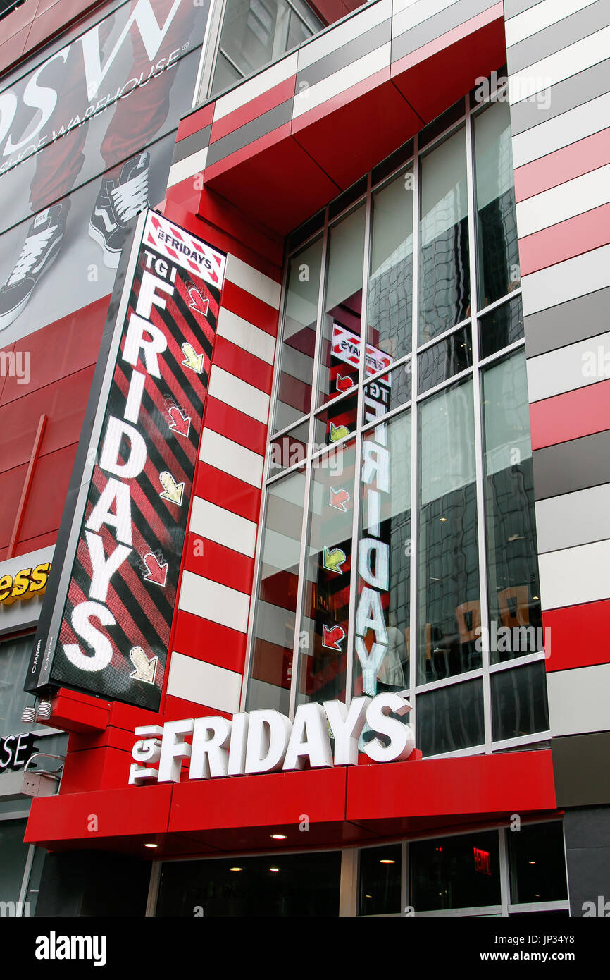 Big sign at the entrance to a TGI Fridays restaurant in Manhattan. Stock Photo