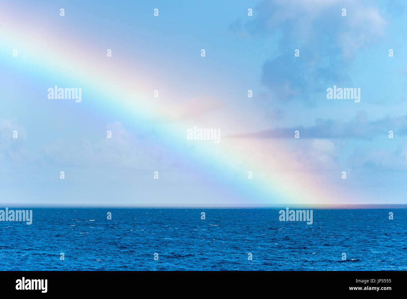 Rainbow over the Caribbean Sea in Martinique Stock Photo