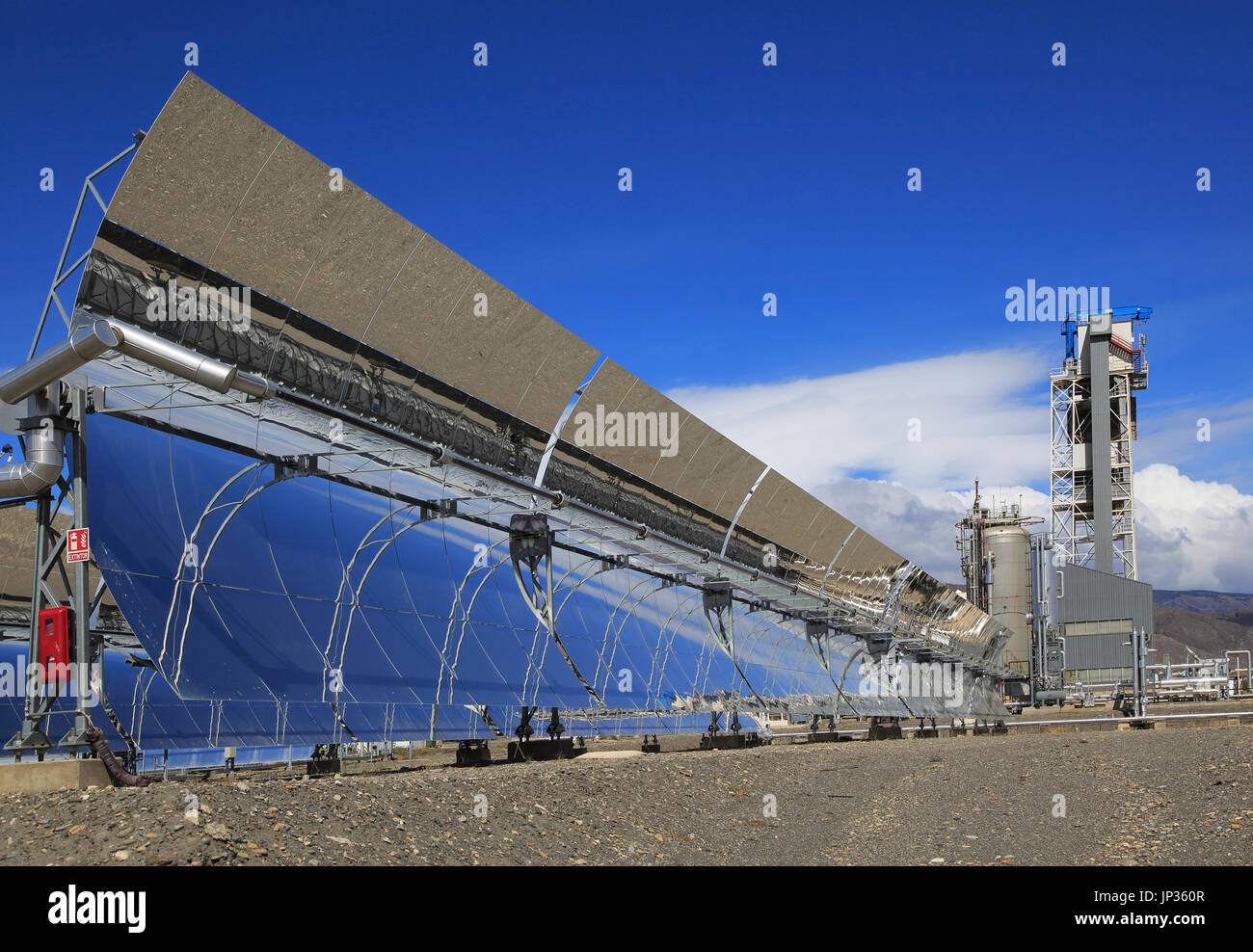 Curved concave reflector panels desalinisation plant at the solar energy scientific research centre, Tabernas, Almeria, Spain Stock Photo