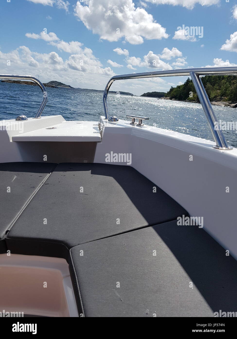 View from the front of a motorboat in the Scandinavian archipelago Stock Photo