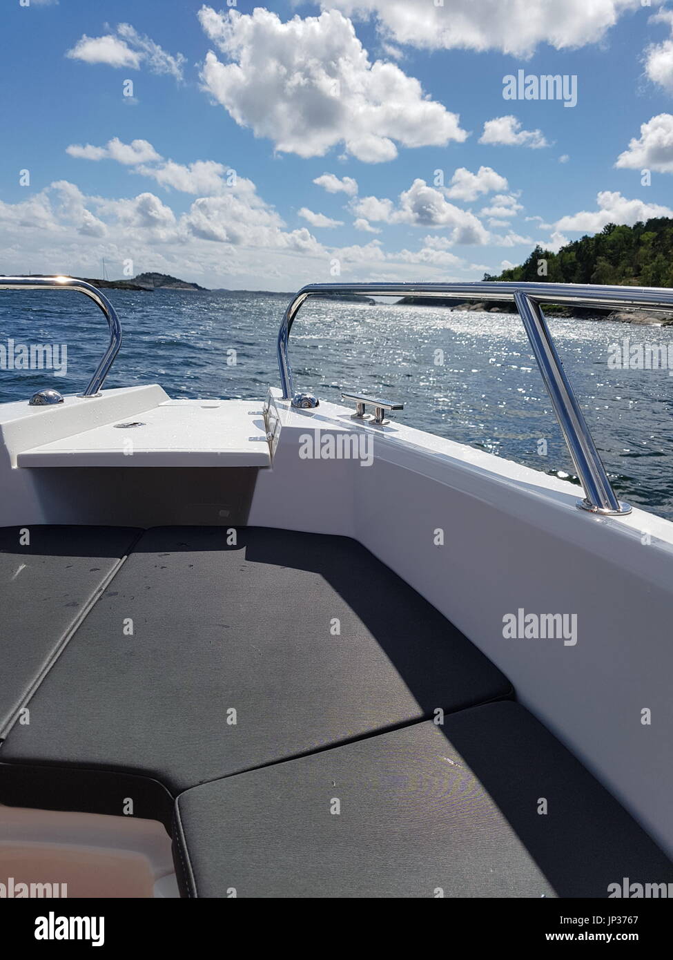 View from the front of a motorboat in the Scandinavian archipelago Stock Photo