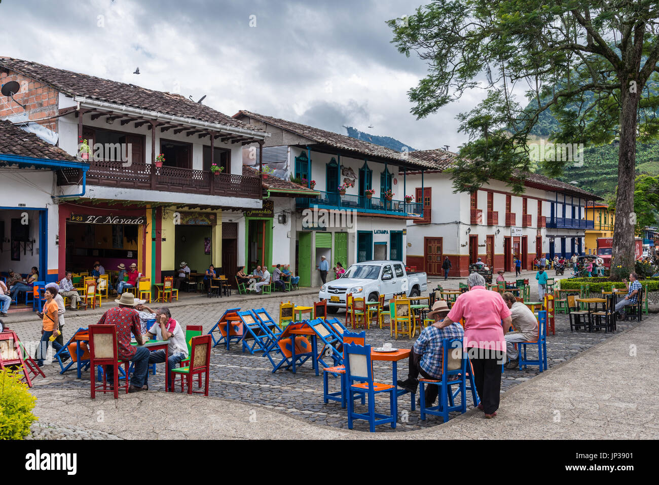 People enjoy the day in historic center of small town Jardin, Colombia, South America Stock Photo