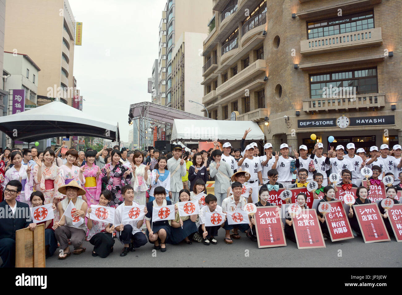 TAINAN, Taiwan - Locals pose in front of Lin Department Store, reopened ...