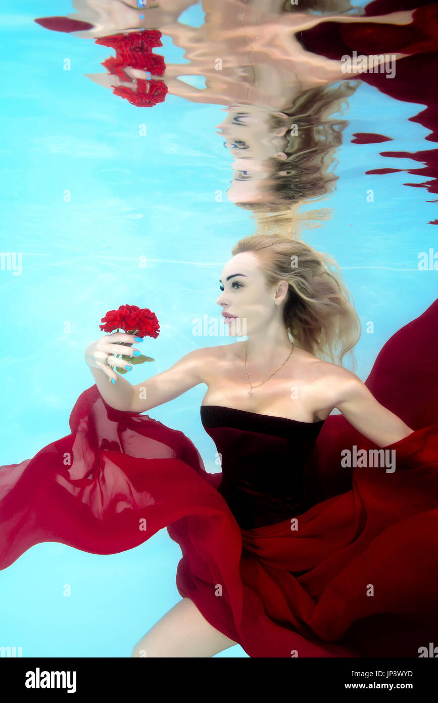 Fashion pool underwater red hi-res stock photography and images - Alamy