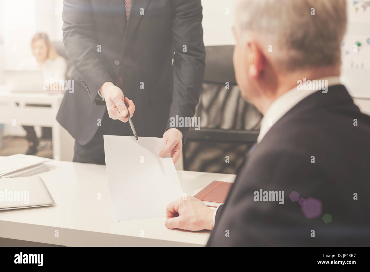Qualified attentive worker asking for bosses signature Stock Photo Alamy