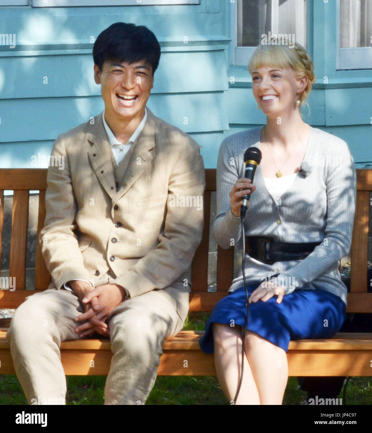 SAPPORO, Japan - Japanese actor Tetsuji Tamayama (L) and U.S. actress Charlotte Kate Fox, a pair of leads in public broadcaster NHK's new serial morning drama 'Massan,' attend a press conference at a distillery of Nikka Whisky Distilling Co. in Yoichi, Hokkaido Prefecture, on June 2, 2014. The program, featuring the life of Japanese whiskey pioneer Masataka Taketsuru, will start in September. (Kyodo) Stock Photo
