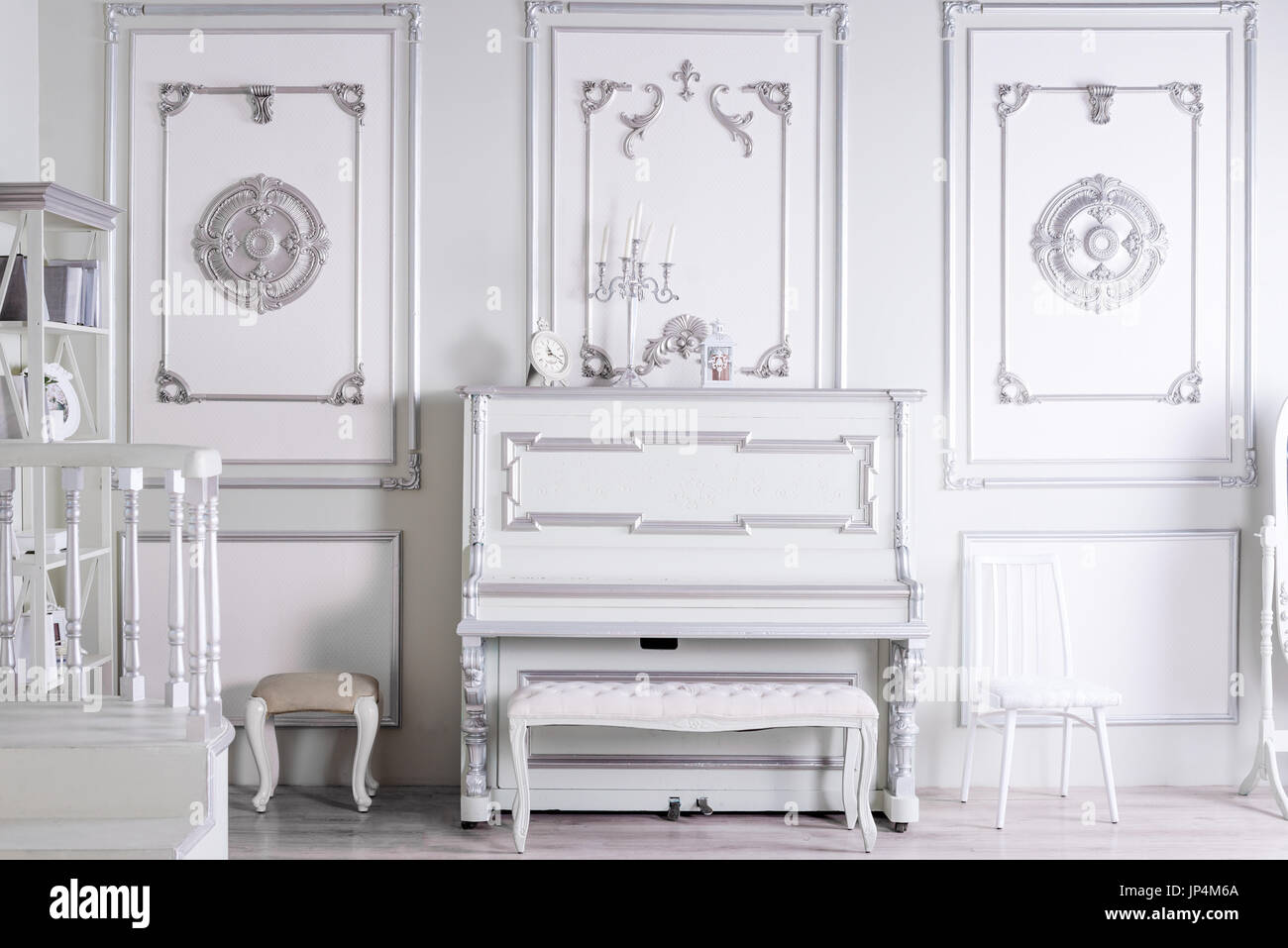 Light classic living room interior with piano. Luxurious apartments ...