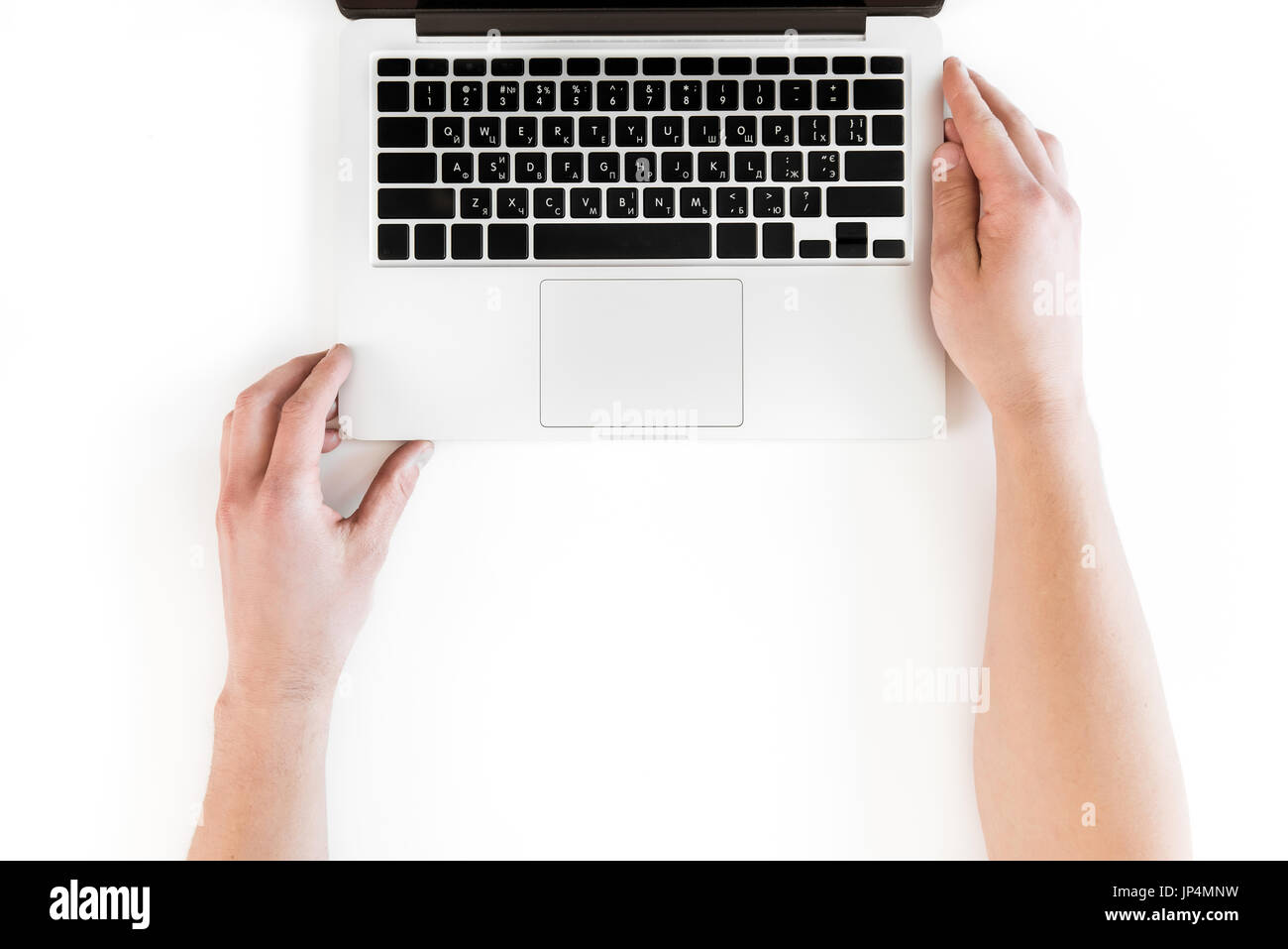 top view of human hands and laptop computer isolated on white, wireless communication concept Stock Photo