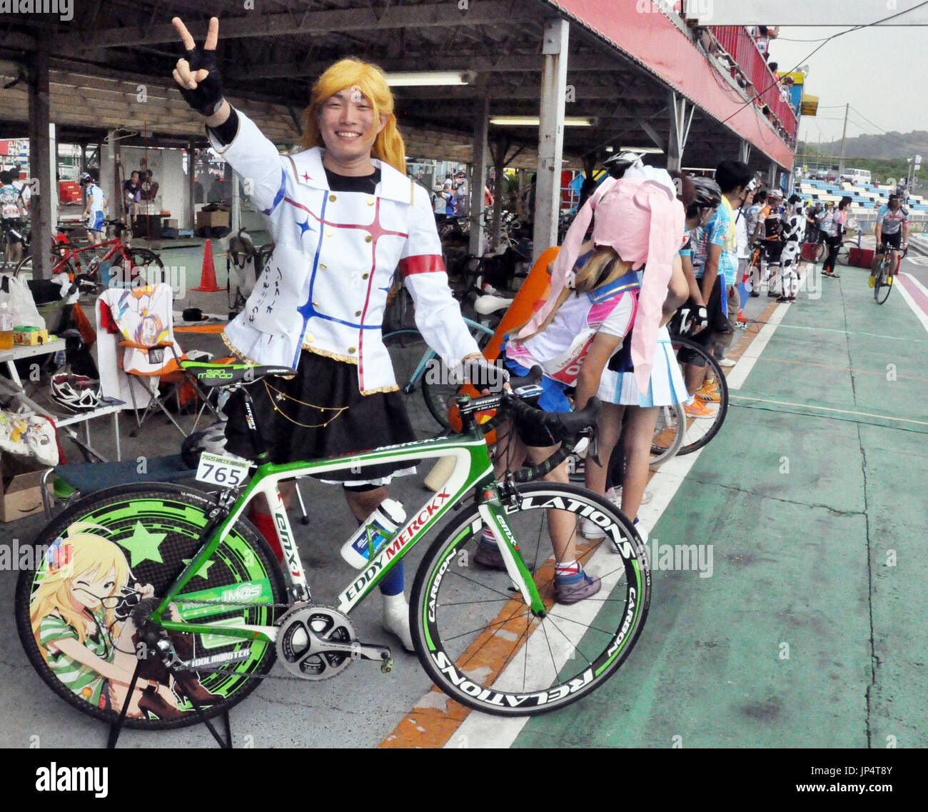 CHIBA, Japan - A participant dressed as an anime character waits to ...
