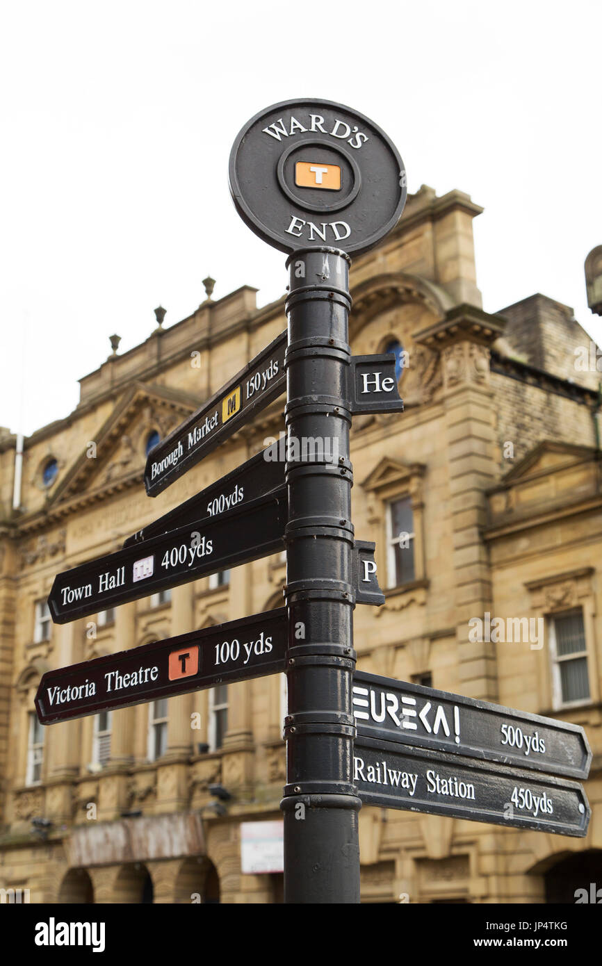 A sign points to tourist attractions and places of interest in Halifax, England. The Victorian Theatre and Town Hall count among the sights of interes Stock Photo