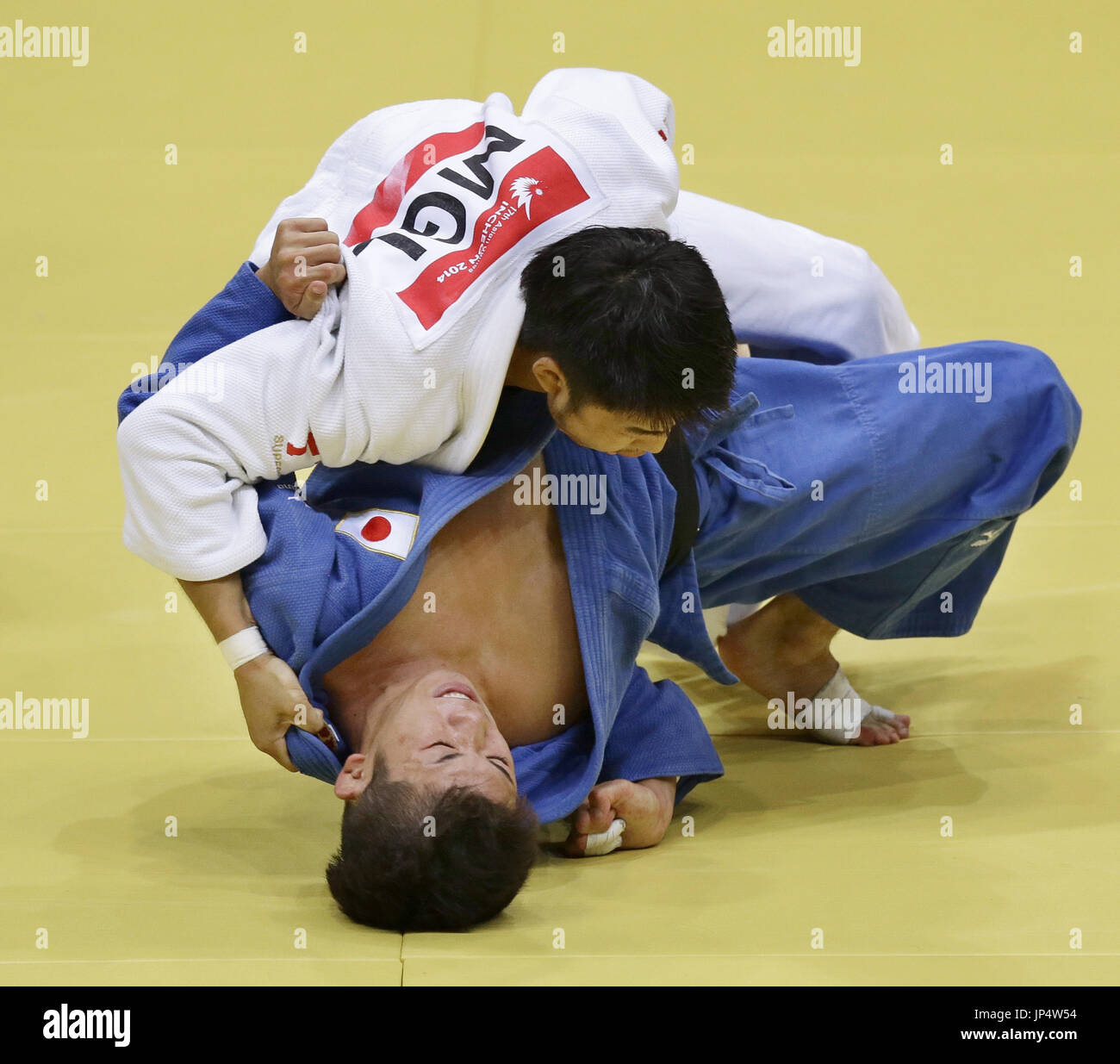 INCHEON, South Korea Japan's Tomofumi Takajo (below) succumbs to