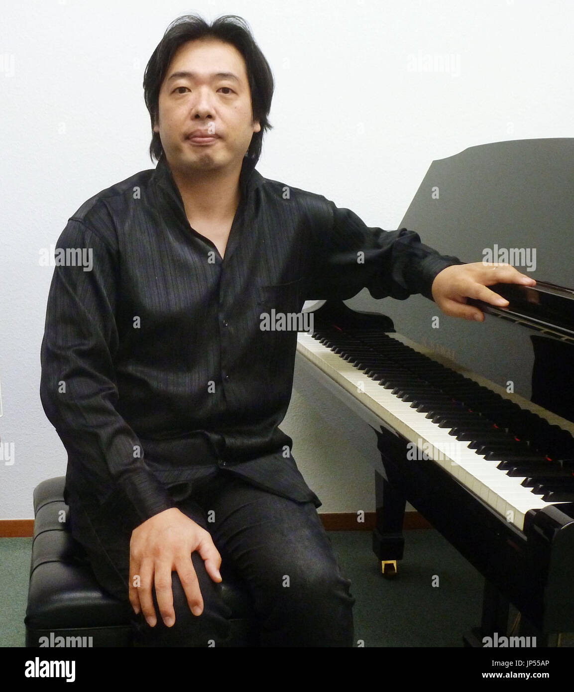 TONDABAYASHI, Japan Opera/musical conductor Masaki Imura poses in