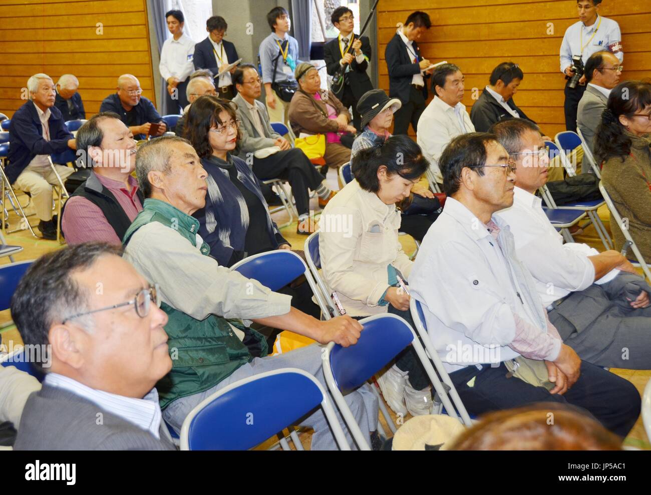SATSUMASENDAI, Japan Citizens of the city of Satsumasendai, Kagoshima Prefecture, watch live