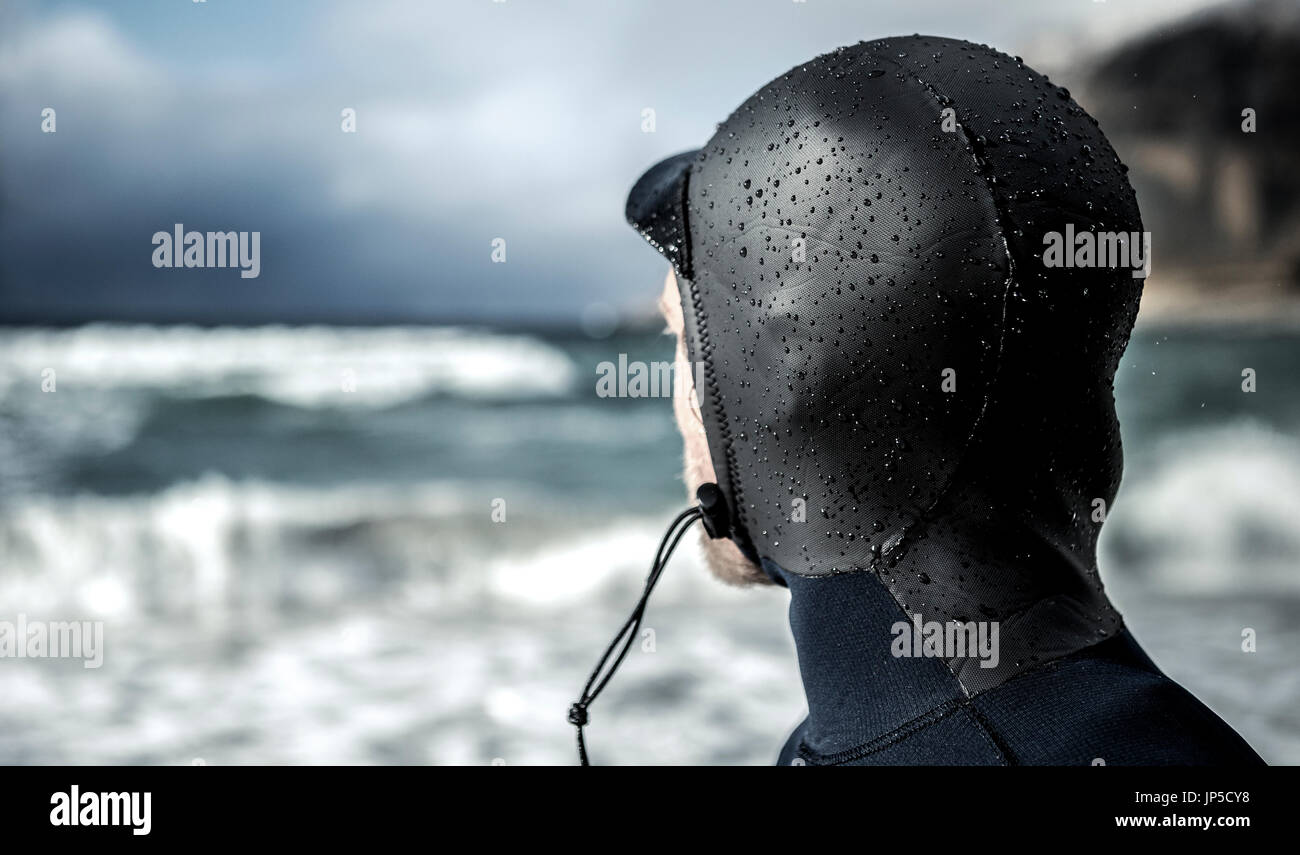 Rear view of a male surfer hi-res stock photography and images - Alamy