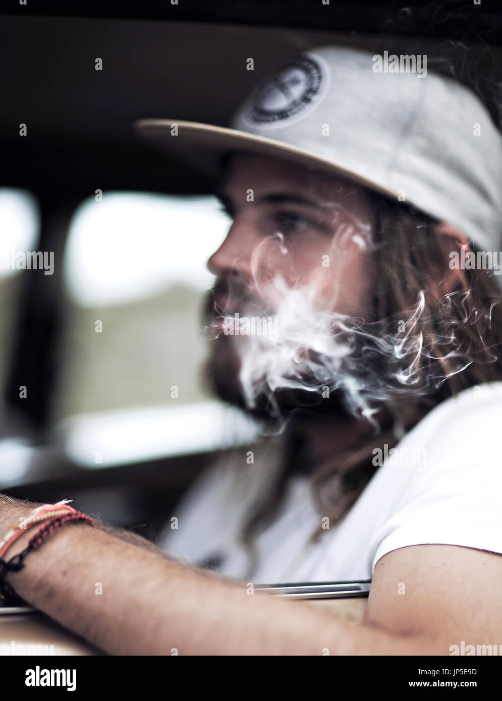 Bearded man in baseball cap hi-res stock photography and images - Alamy