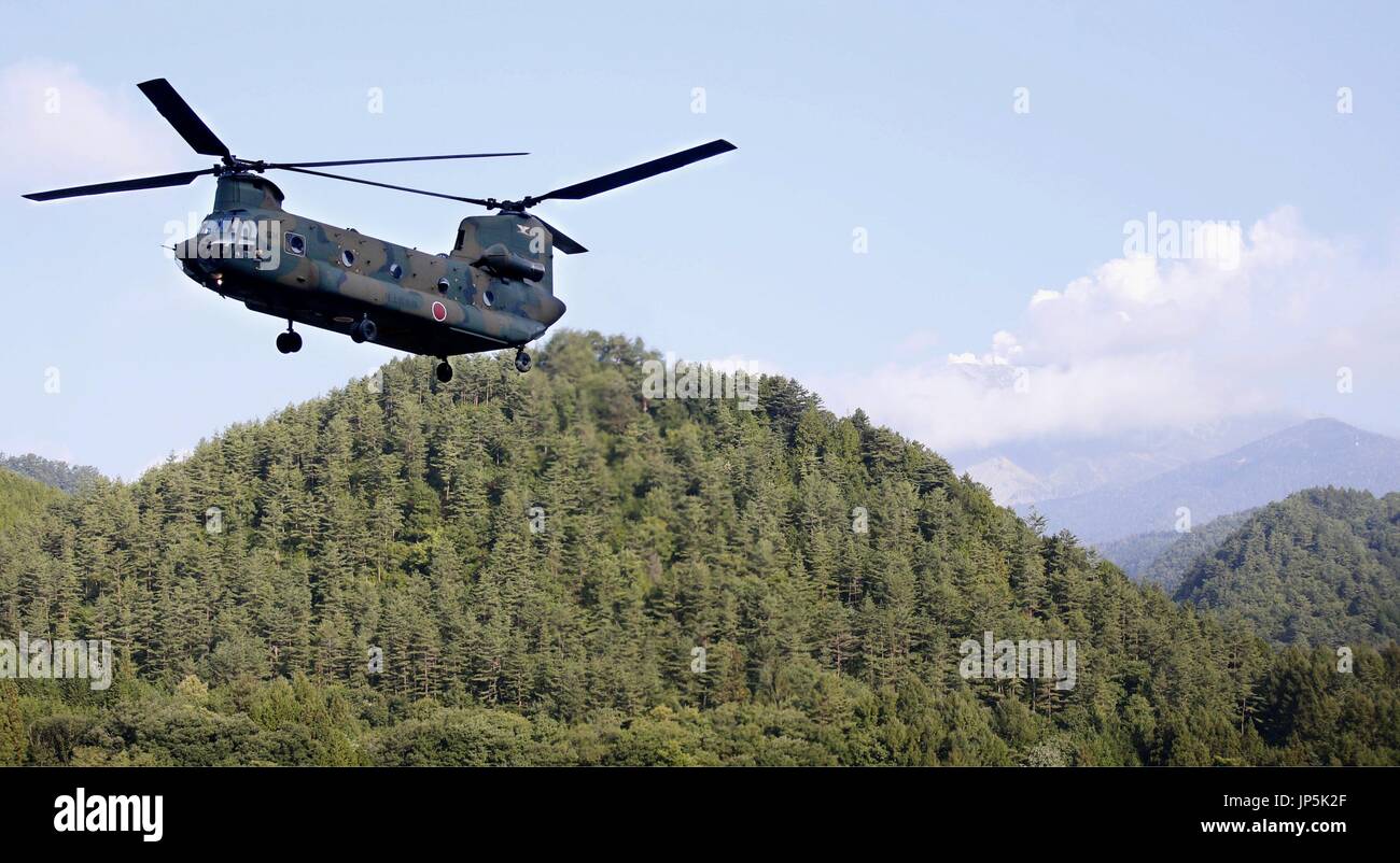 OTAKI, Japan - A Ground Self-Defense Force helicopter carrying rescue ...