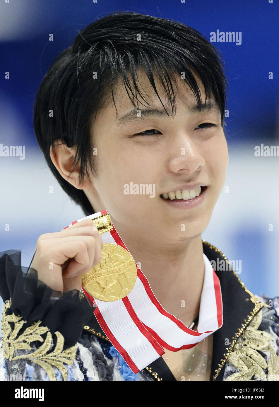 NAGANO, Japan Yuzuru Hanyu poses with his medal won in the Japan