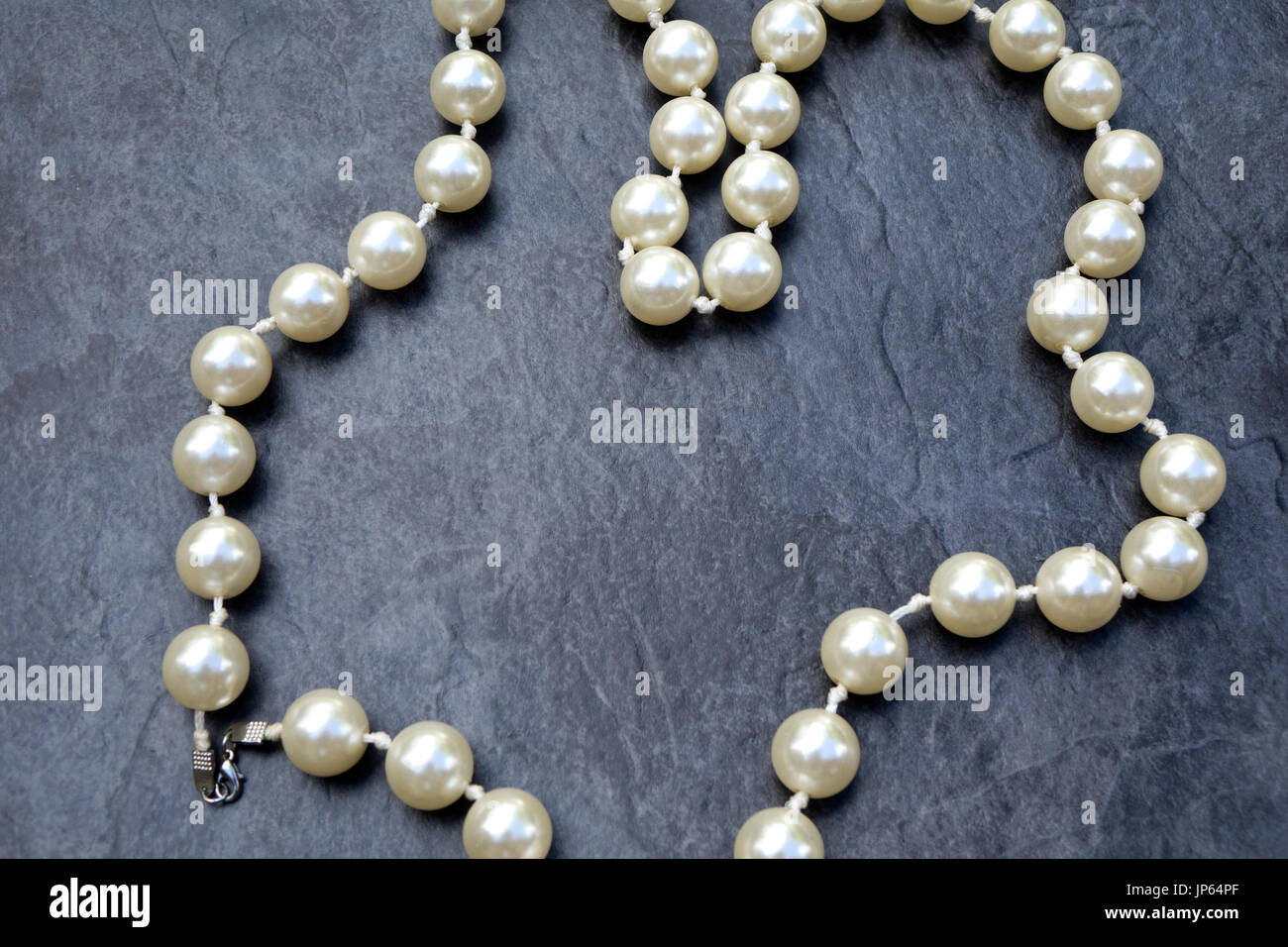 Fake pearls hi-res stock photography and images - Alamy