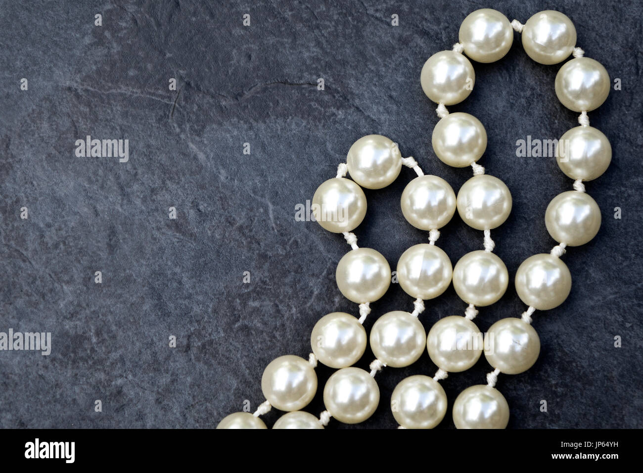 a string of fake pearls Stock Photo