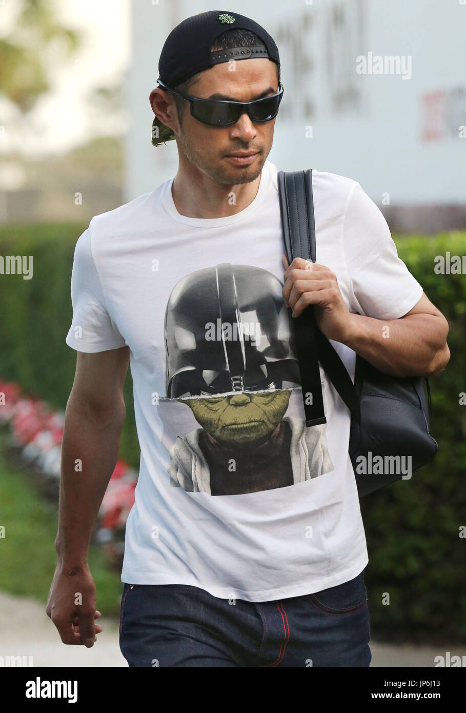 Miami Marlins outfielder Ichiro Suzuki arrives at the club's spring