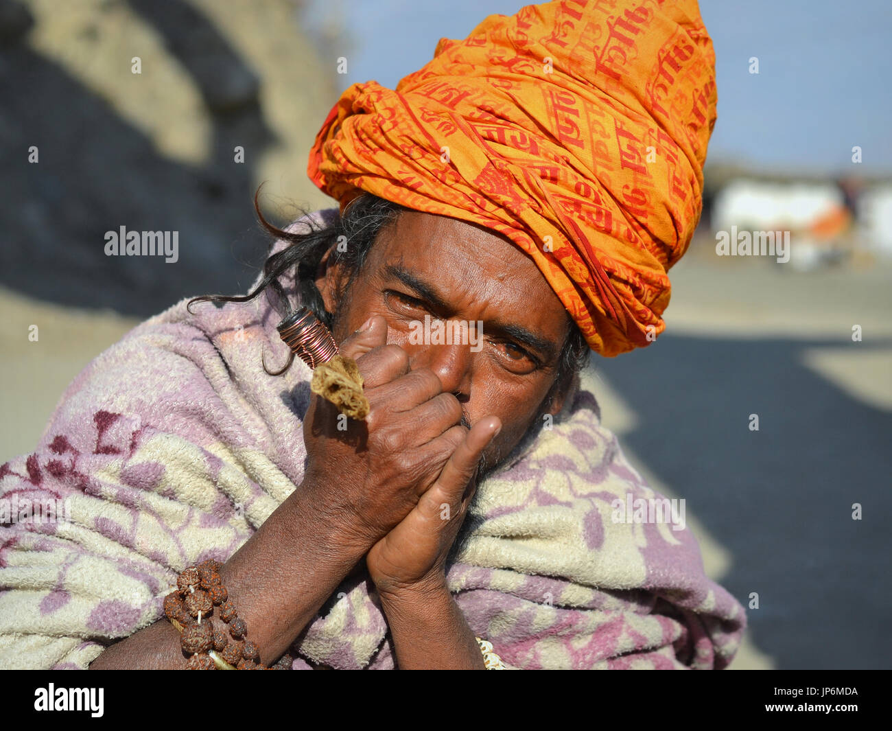 Nepalese Sadhu with Chillum Pipe, Muktinath. Stock Photo