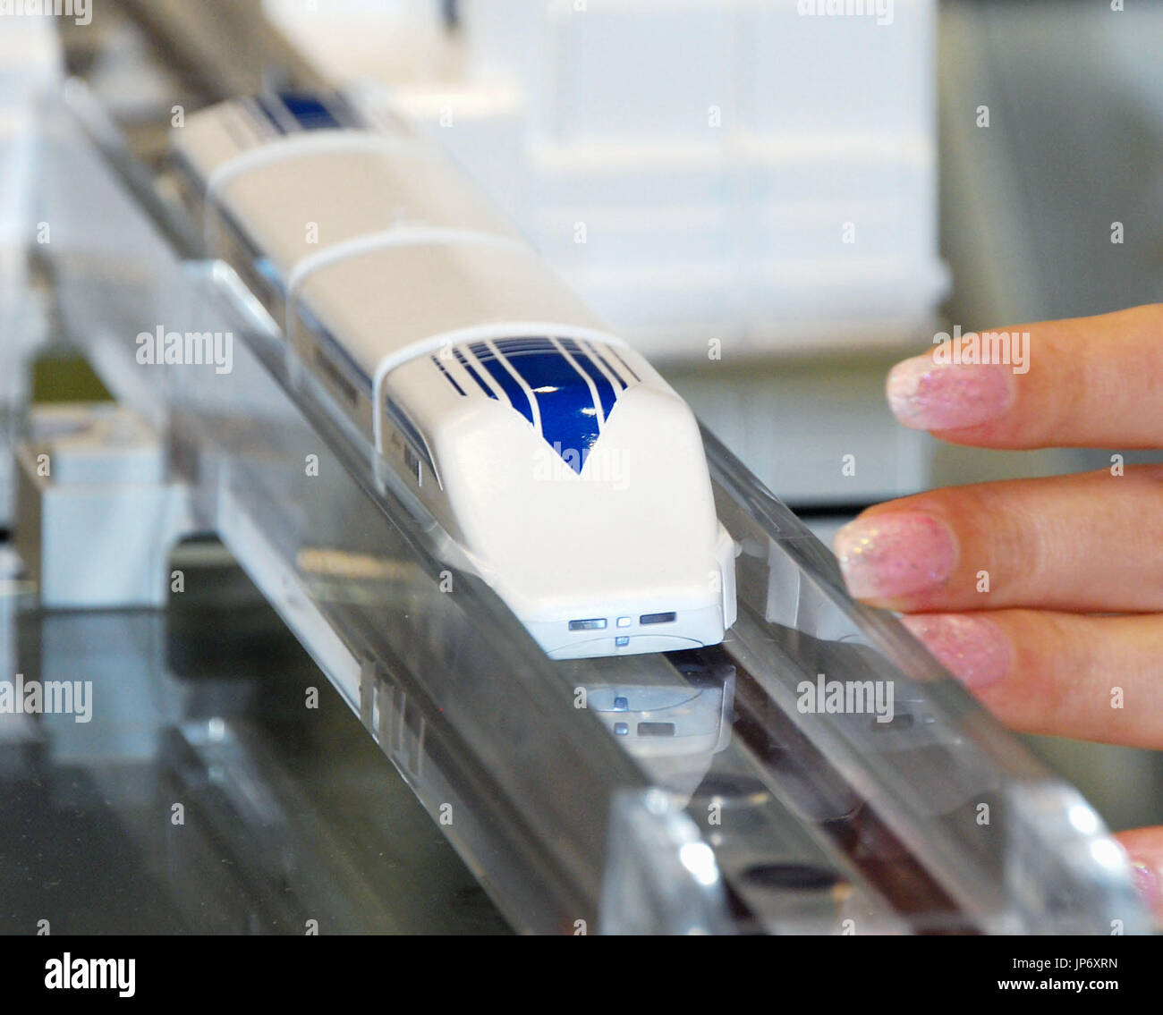 Photo taken May 26, 2015, in Tokyo shows a miniature maglev train to be ...