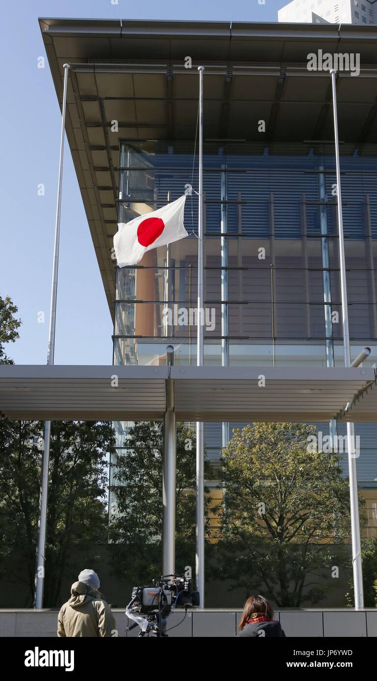 The Japanese flag is hung at halfmast in front of the prime minister's