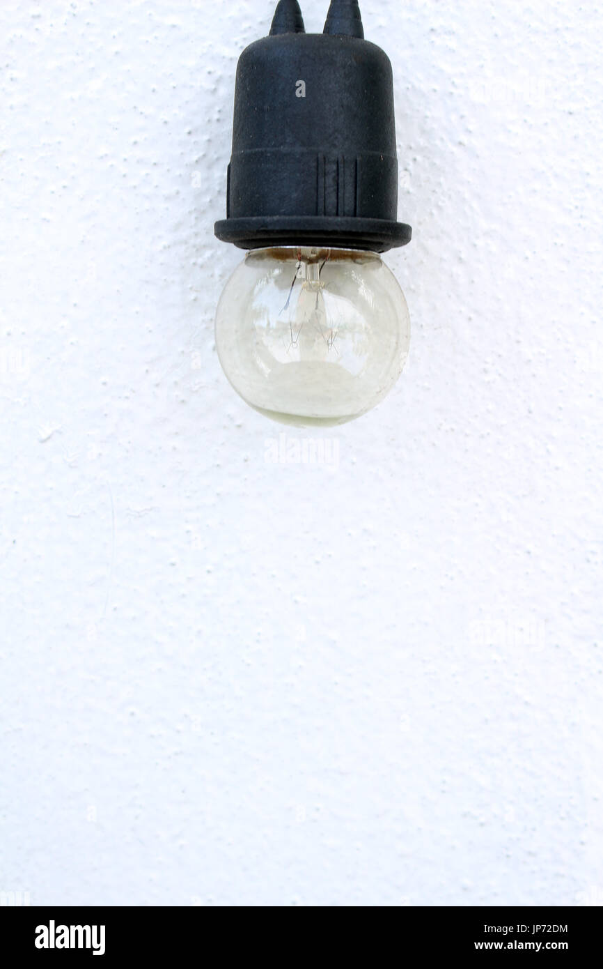 bulb on white wall background Stock Photo
